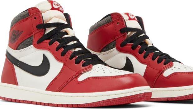 View of red, white, and black Air Jordan 1 shoes.